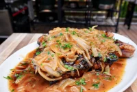 Succulent Pork Chops with Robust Beer Gravy
