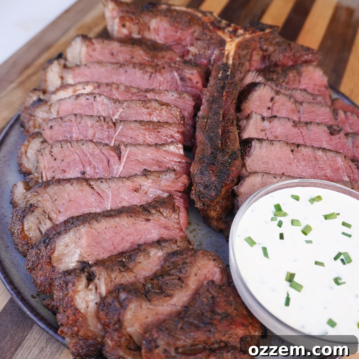 Two Cuts, One Legendary Steak 7 Grilled Porterhouse steak resting on a cutting board after cooking