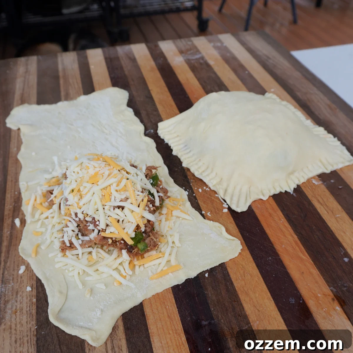 Savory Puff Pastry Parcels 4 Detailed shot of assembling puff pastry pockets, showing filling placement.