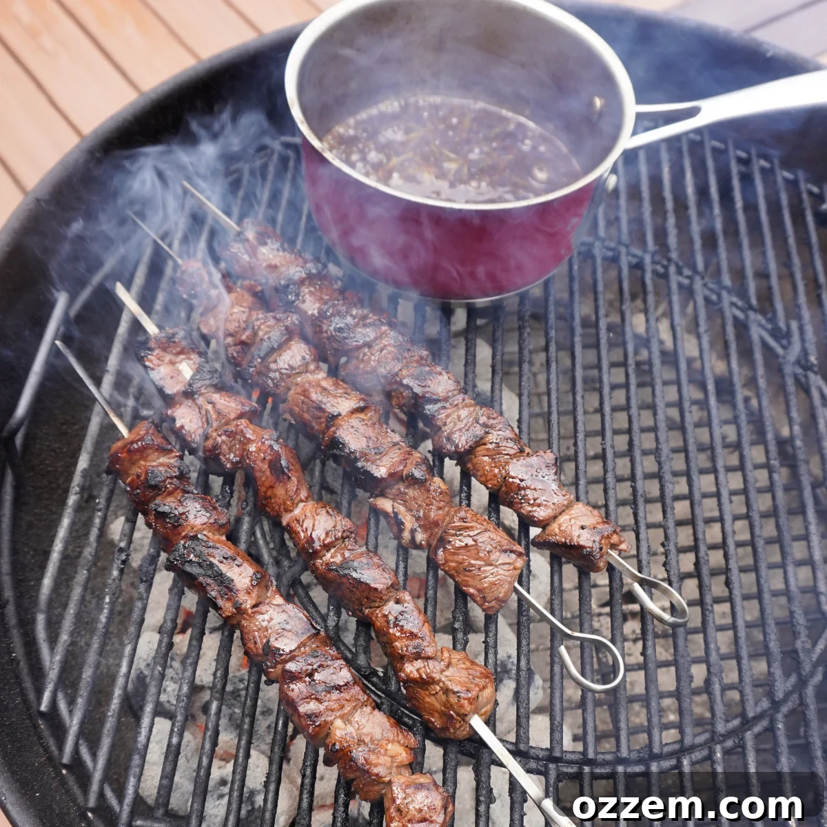 Zesty Balsamic Lamb Skewers 6 Grilled balsamic citrus lamb skewers on a grill.