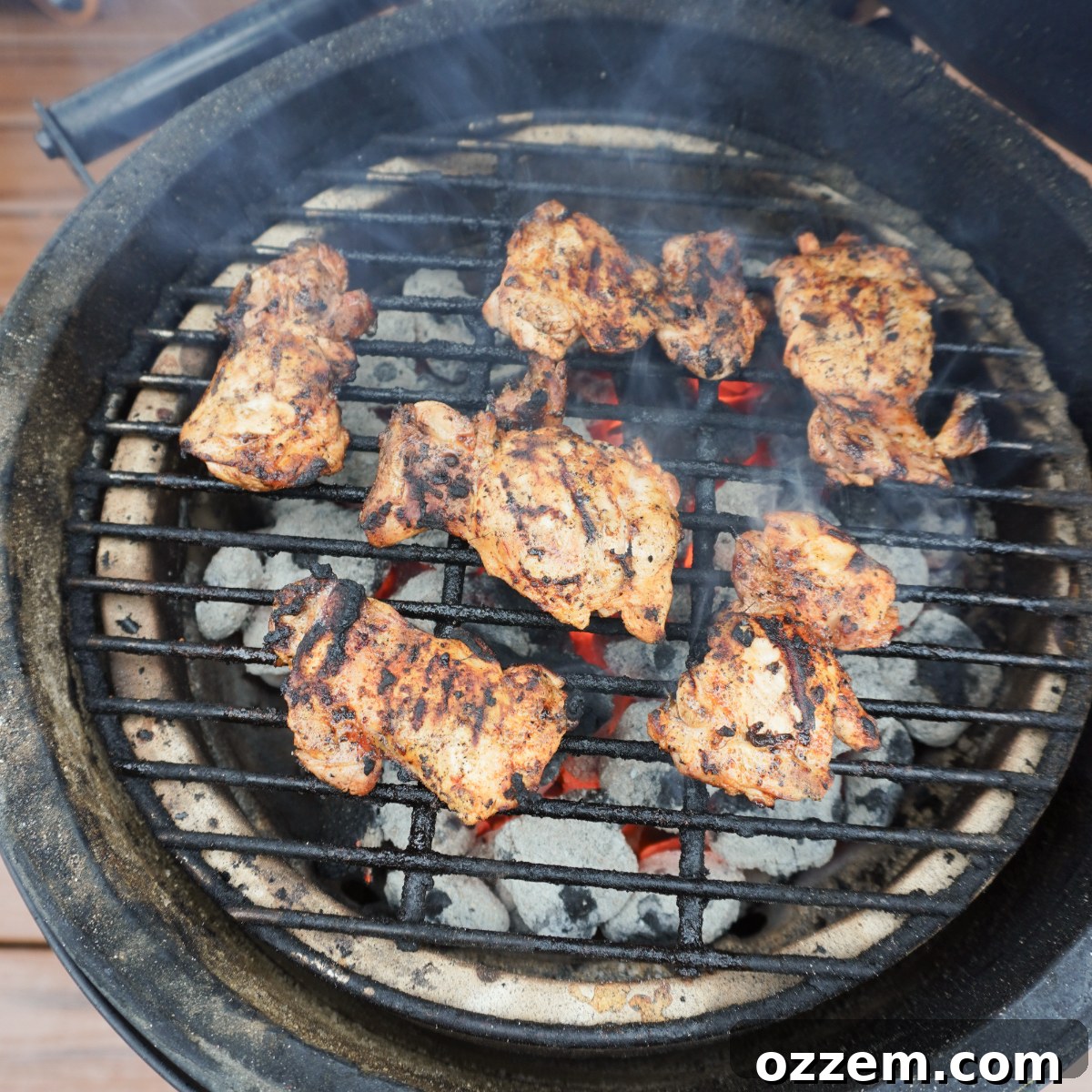 Chili Charred Chicken Sandwich 5 Grilled spicy chicken thighs cooked on a charcoal grill with melted cheese