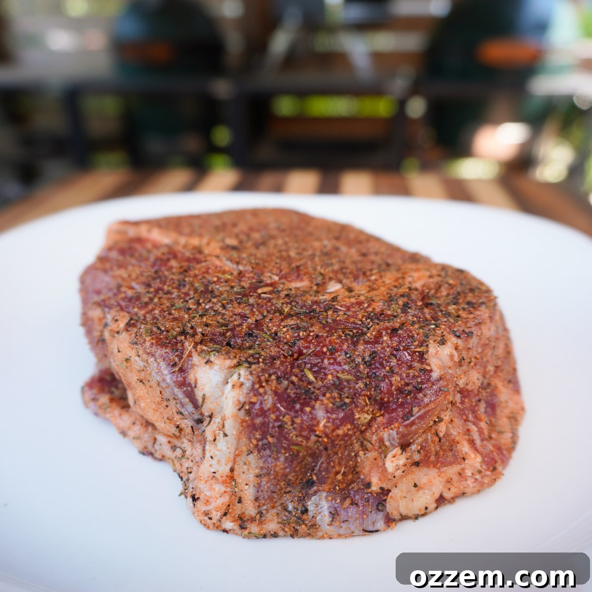 Chargrilled Steak Crostini 4 Thick cut ribeye steak, showcasing rich marbling, prepared for seasoning.