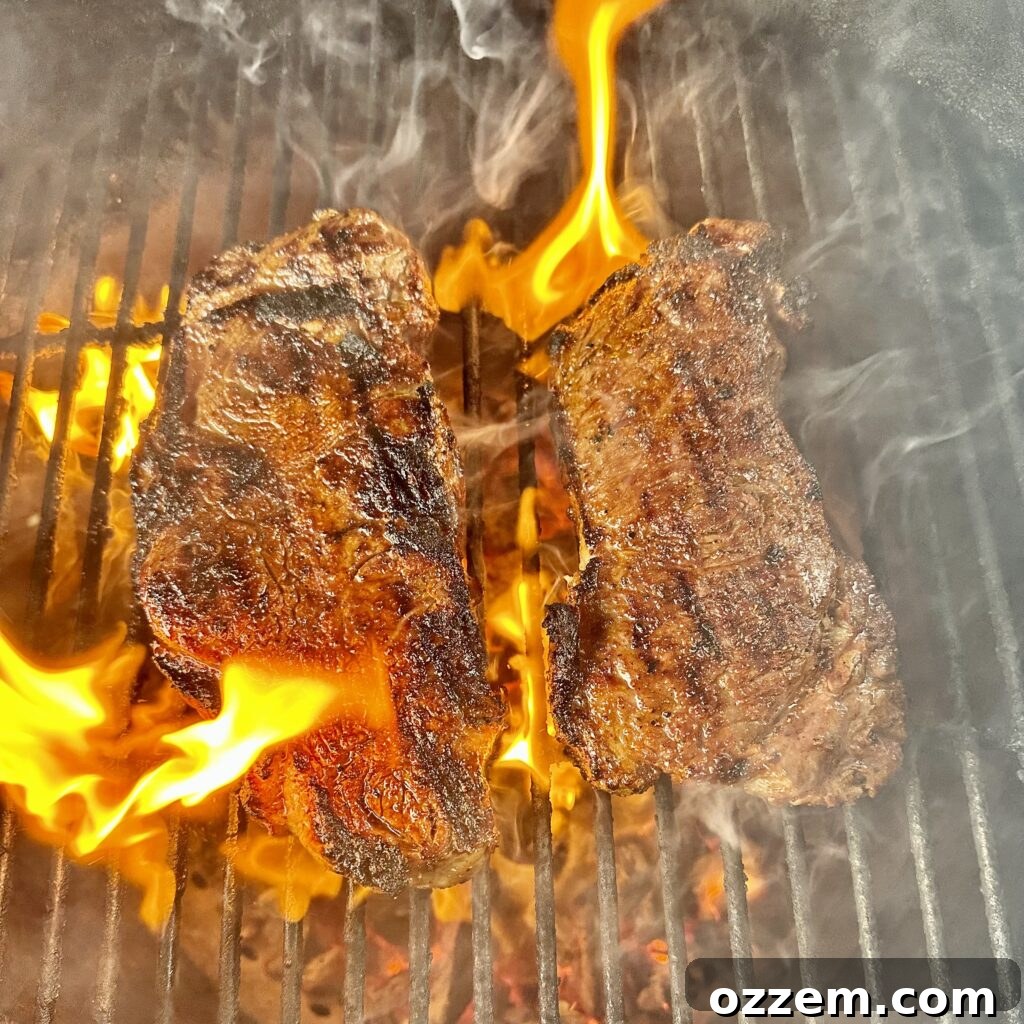 Chargrilled Steak Crostini 6 Perfectly grilled ribeye steak with diamond grill marks, resting on a cutting board.