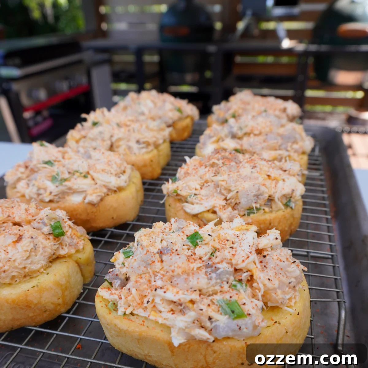 Gourmet Smoked Shrimp and Crab Toast 6 Loaded toasts with the shrimp and crab mixture on a wire rack.
