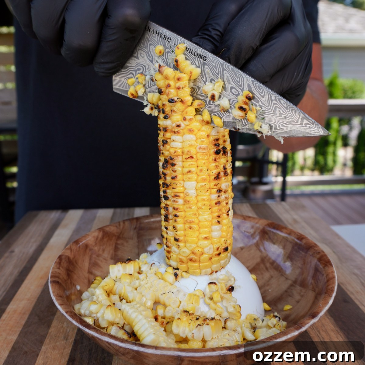Ingredients for corn salad dressing, including mayo, sour cream, and chipotles, ready to be blended