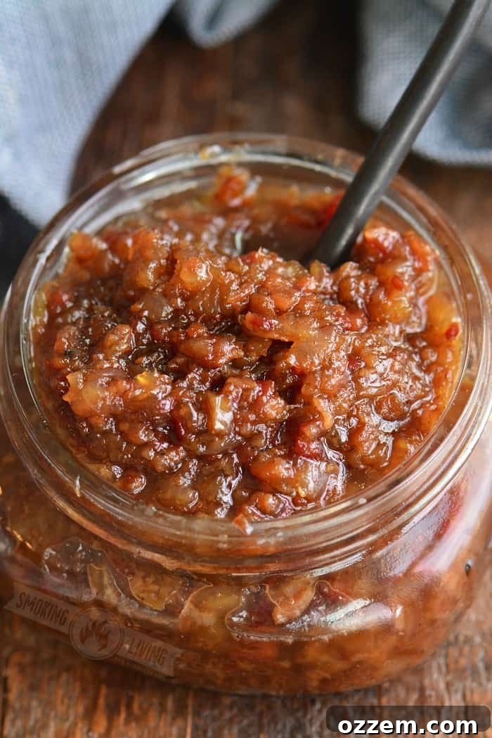 Bacon jam in a glass jar, ready to be served