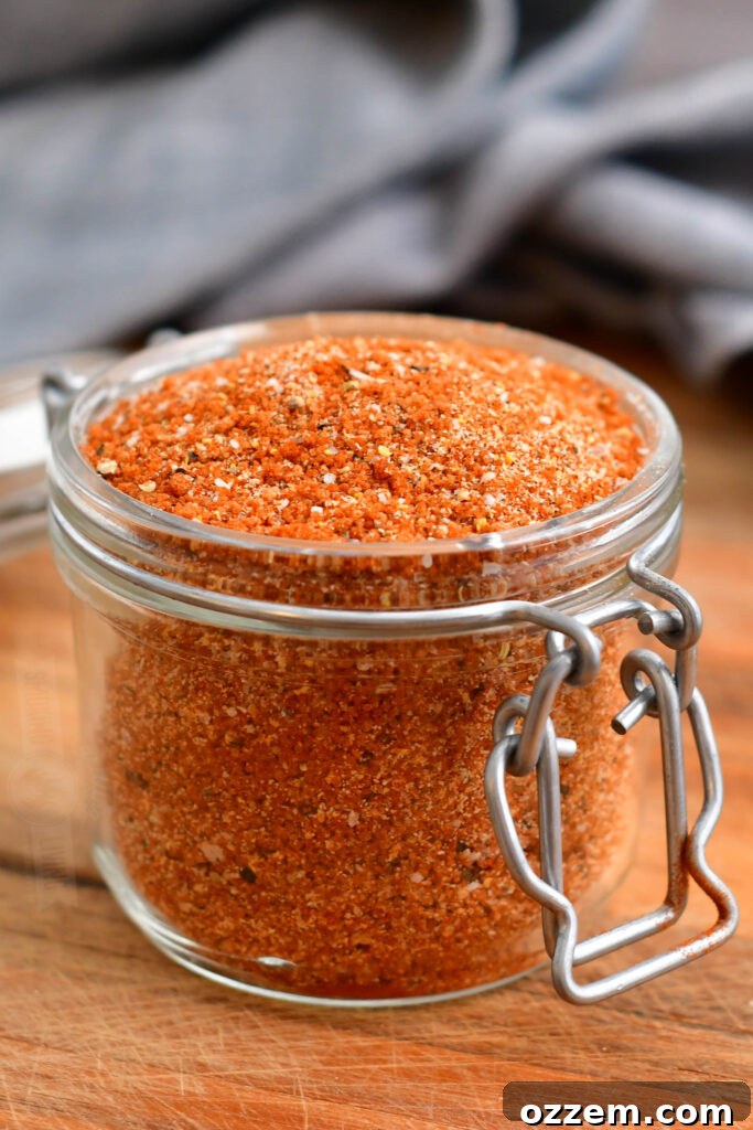 Closeup of glass jar filled with homemade dry rub for ribs