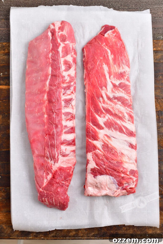 raw rack of baby back ribs and St Louis cut ribs side by side