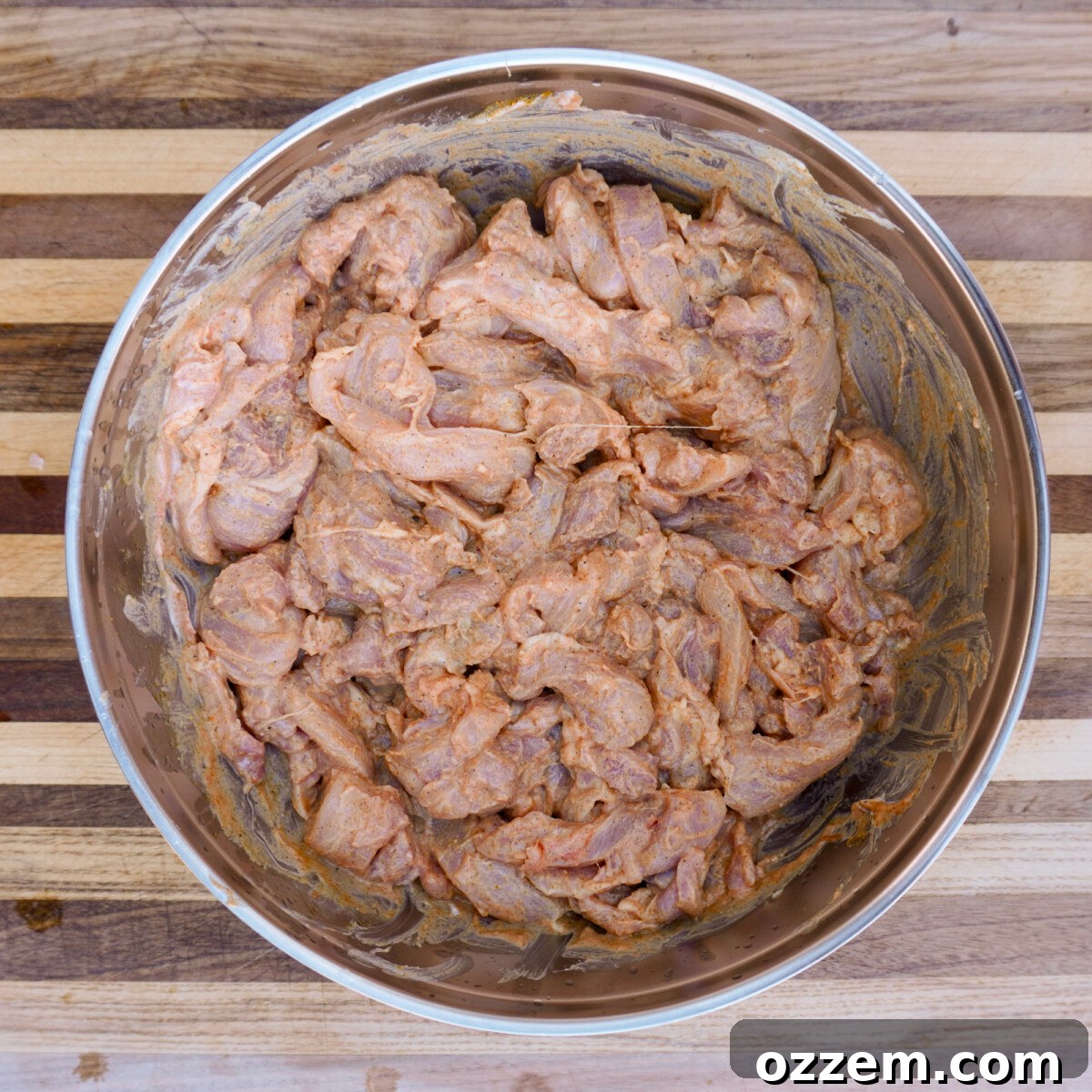 Flame Kissed Chicken Shawarma 5 Chicken strips fully coated in a rich, yogurt-based shawarma marinade.