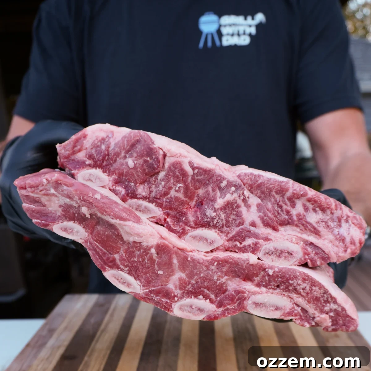 Succulent Smoked Beef Short Ribs 3 Raw beef short ribs, a full rack displaying ample meat and marbling, ready for preparation.