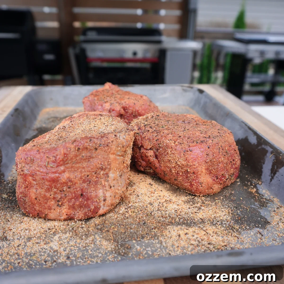 seasoned fillets on a sheet pan. 