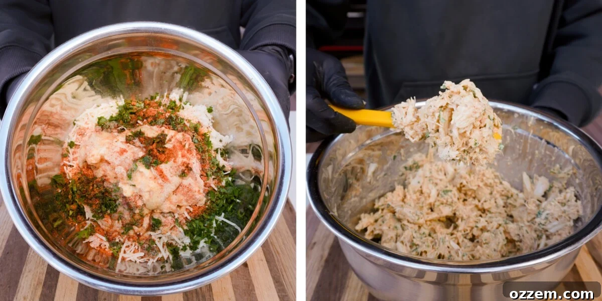 Crab stuffing ingredients mixed in a silver bowl, ready to be used.