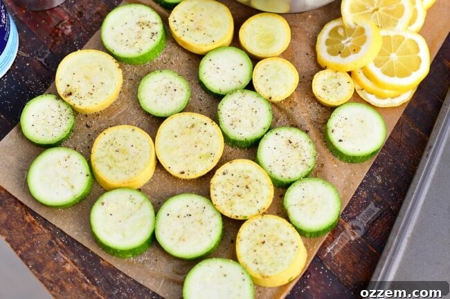 sliced zucchini and squash on a metal sheet pan