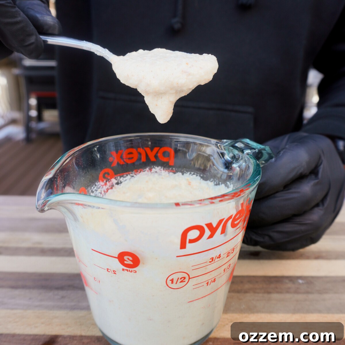 Milk and breadcrumbs soaking together to form a paste for meatloaf.