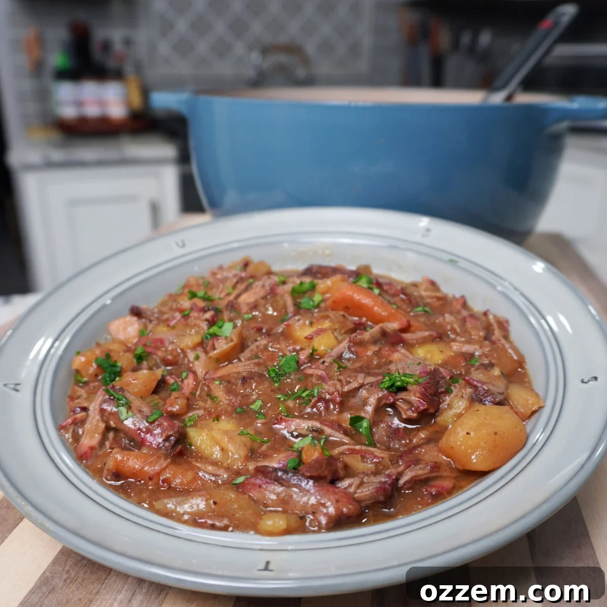 Easy smoked pot roast dinner plated with carrots and potatoes, ready to serve.