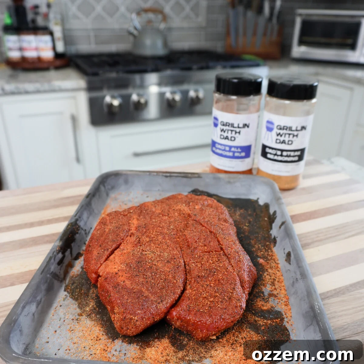 A generously seasoned chuck roast, ready for smoking.