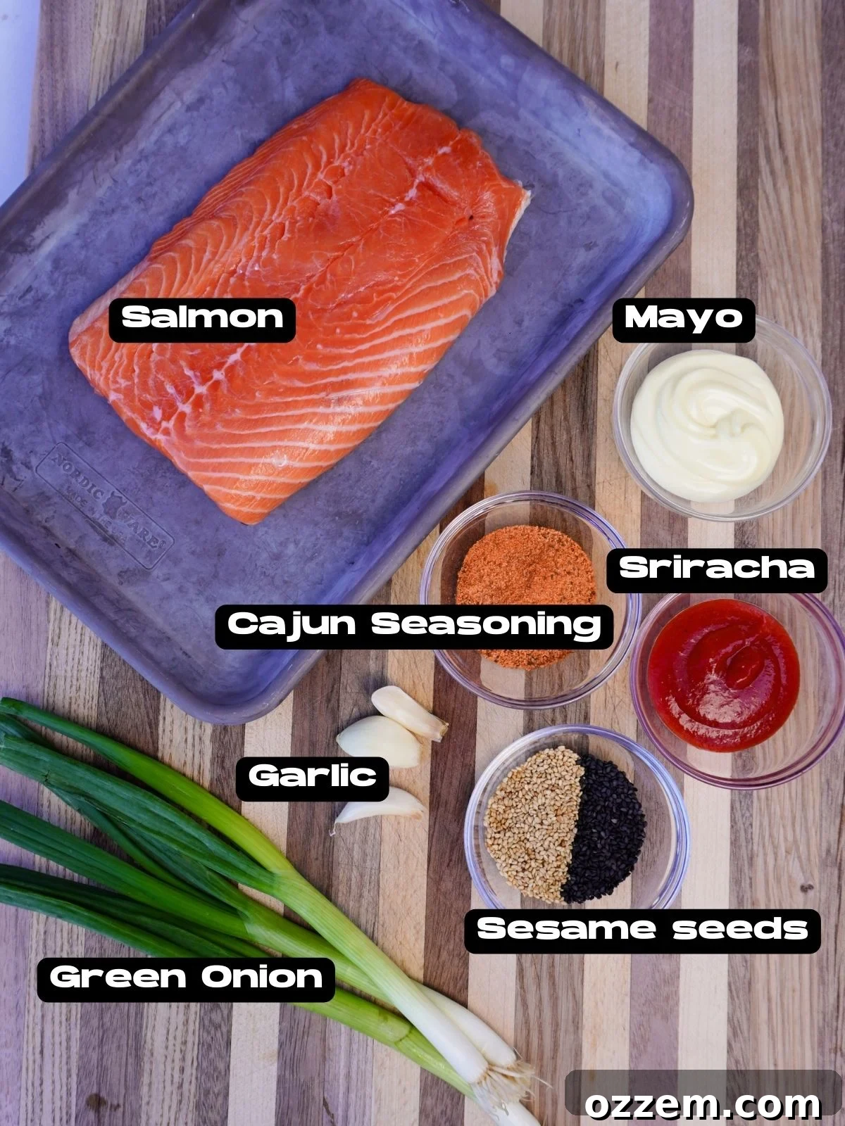 Golden Cajun Salmon Poppers 3 A collection of fresh ingredients for Crispy Cajun Salmon Bites, including salmon, spices, and sauce components.