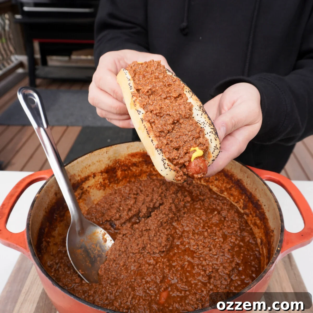 Smoked Chili Fire Dog 2 Irresistible smoked chili hot dog, perfectly topped and ready to enjoy.