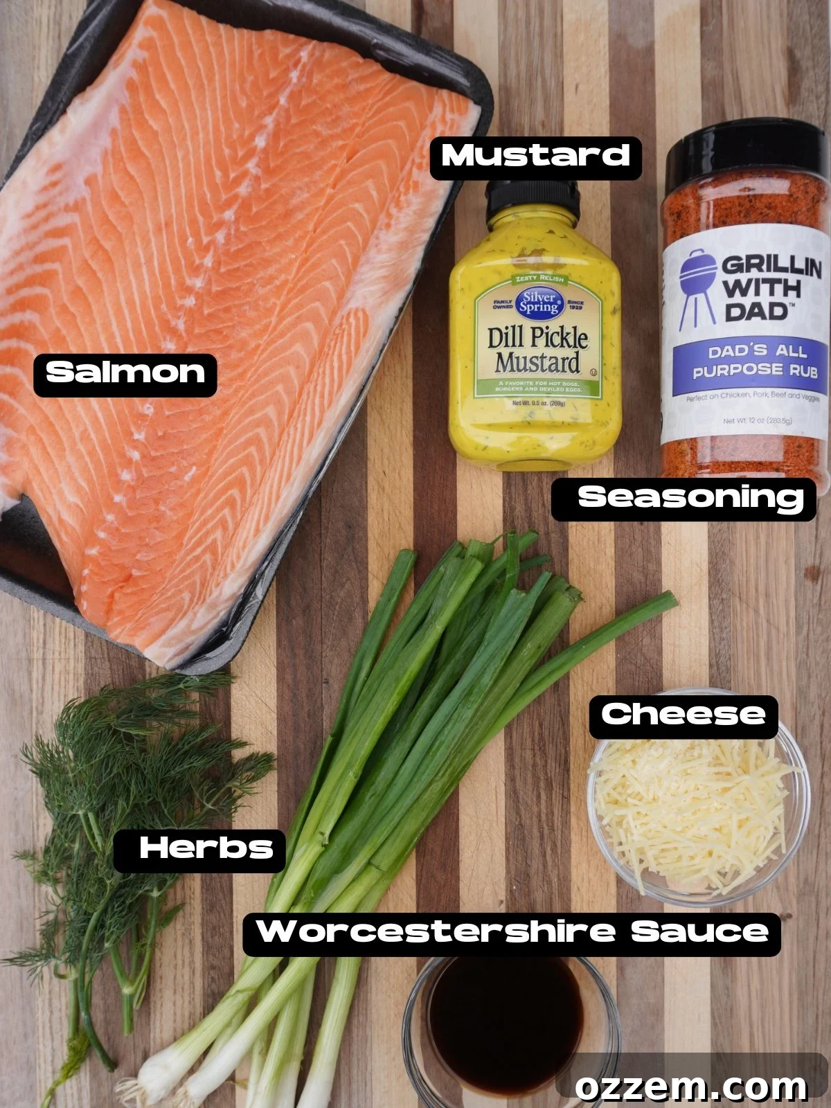 Ingredients for salmon with dill mustard sauce, including salmon, dill pickle mustard, parmesan, and fresh dill.