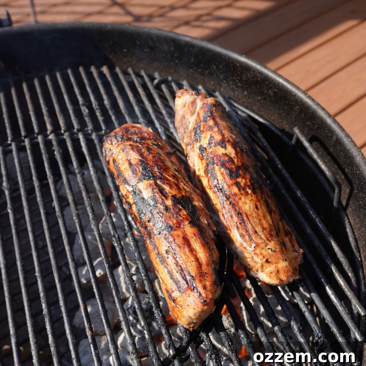 Sweet Meets Savory Pork Tenderloin 7 Grilled sweet and savory pork tenderloin searing over direct heat.