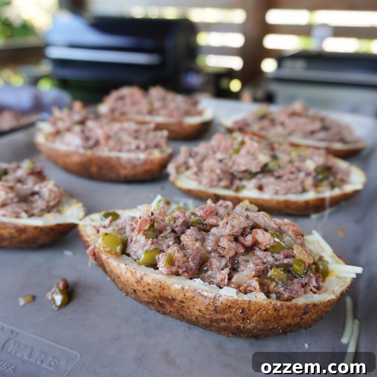 Grilled Cheesesteak Potato skins plated and garnished.