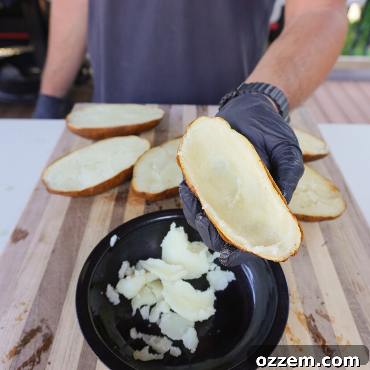 Hollowed-out baked potato skins, perfectly prepared for filling.