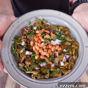 Best Carne en su Jugo plated in a bowl, showcasing its rich colors and fresh toppings.