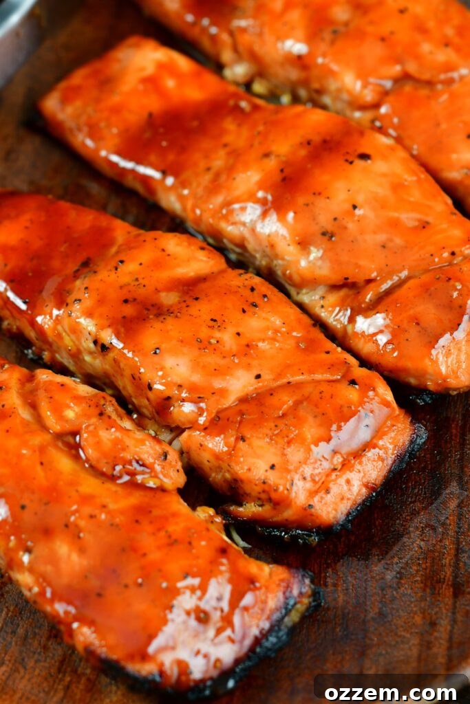 Caramelized Maple BBQ Grilled Salmon 2 Closeup of perfectly grilled salmon with a glistening maple BBQ sauce glaze