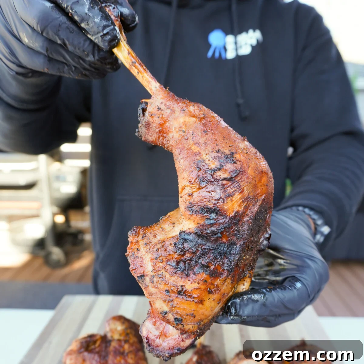 Perfectly grilled sweet tea brined turkey leg and thigh, glistening with flavor.