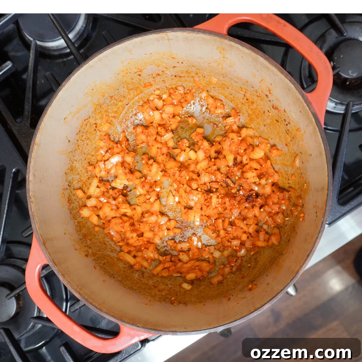 sauteed veggies in dutch oven over stove top.