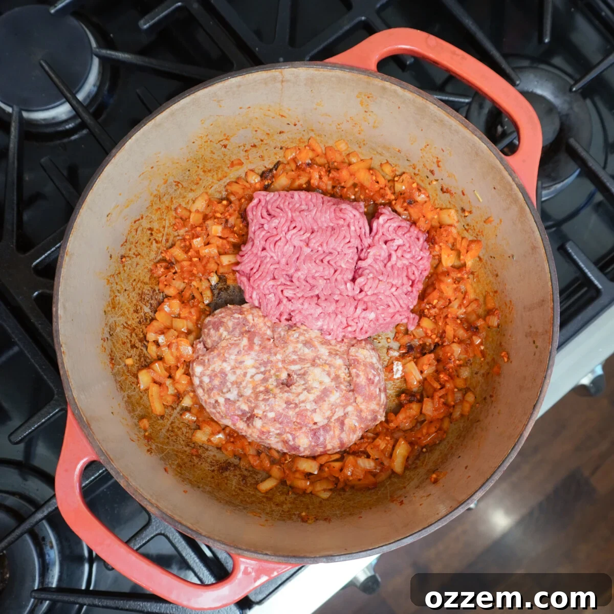 Beef and Italian sausage in dutch oven.