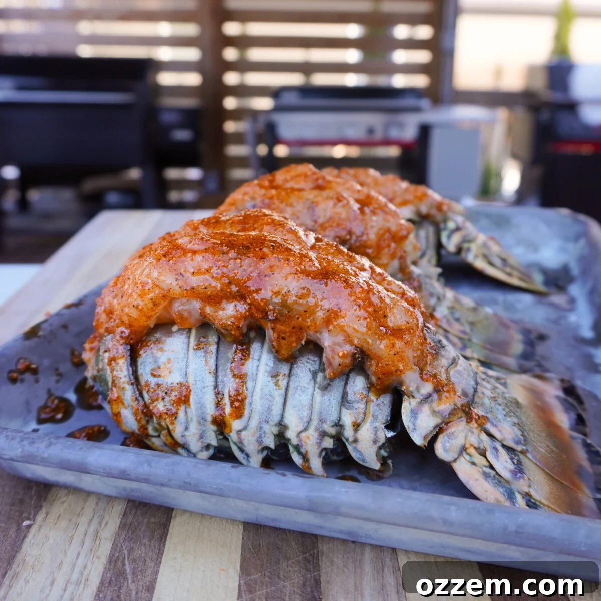 Cajun seasoning applied to butterflied lobster tail.