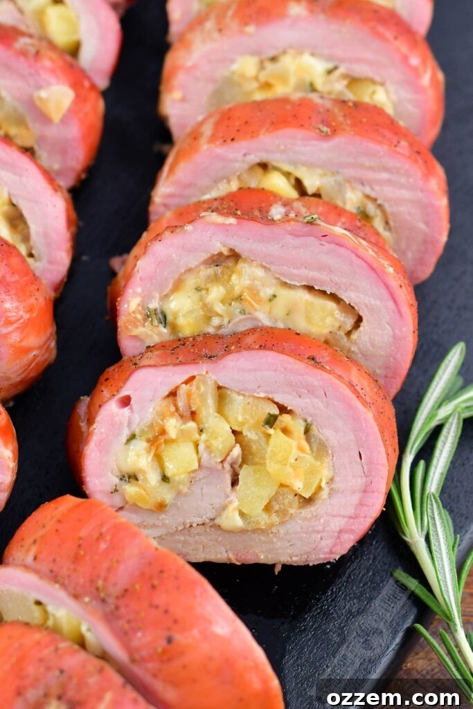 closeup on the stuffing inside the smoked pork tenderloins