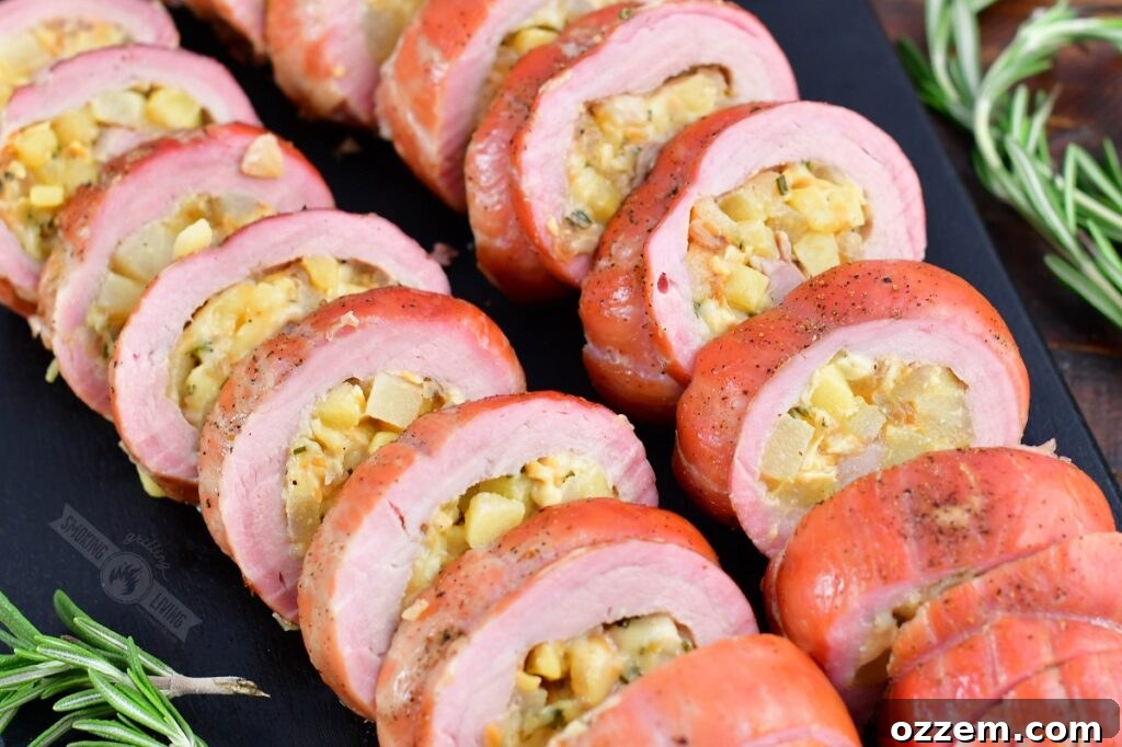 top close view of smoked stuffed pork tenderloin sliced