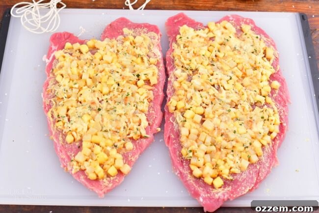 stuffing spread over the butterflied pork tenderloin