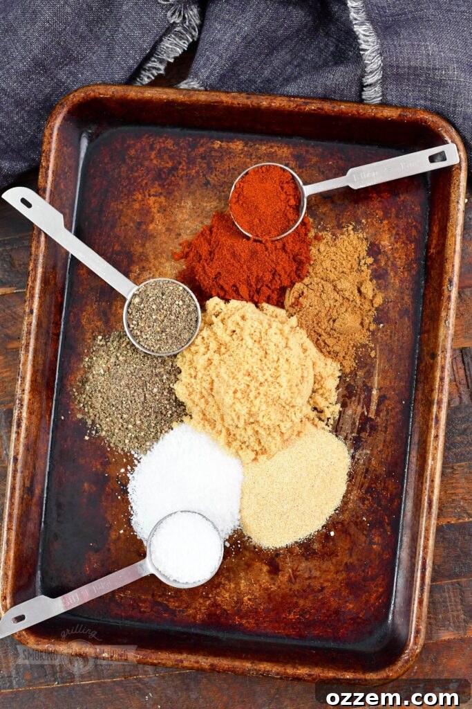 top view of spices of the beef rub on baking sheet, showing individual ingredients