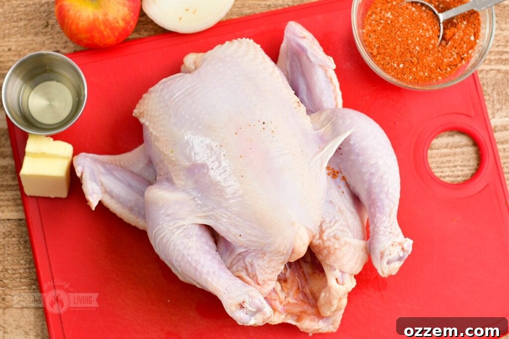 Ingredients for making smoked pulled chicken laid out on a table.
