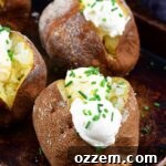 vertical topped potatoes, a close-up showing the fluffy interior and toppings.