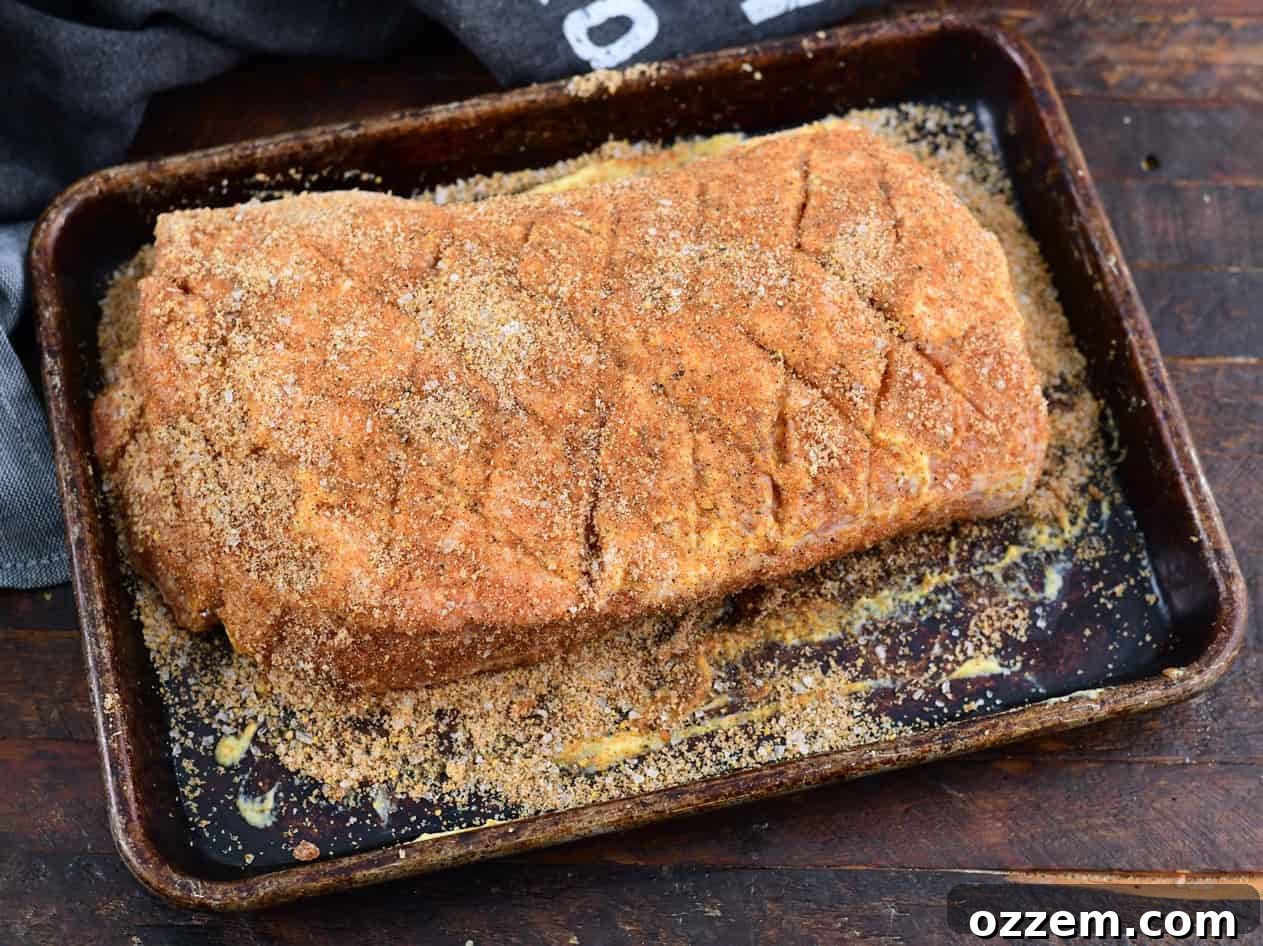 Wood-Fired Pork Loin Perfection 12 The fully seasoned pork loin, ready for the smoker.