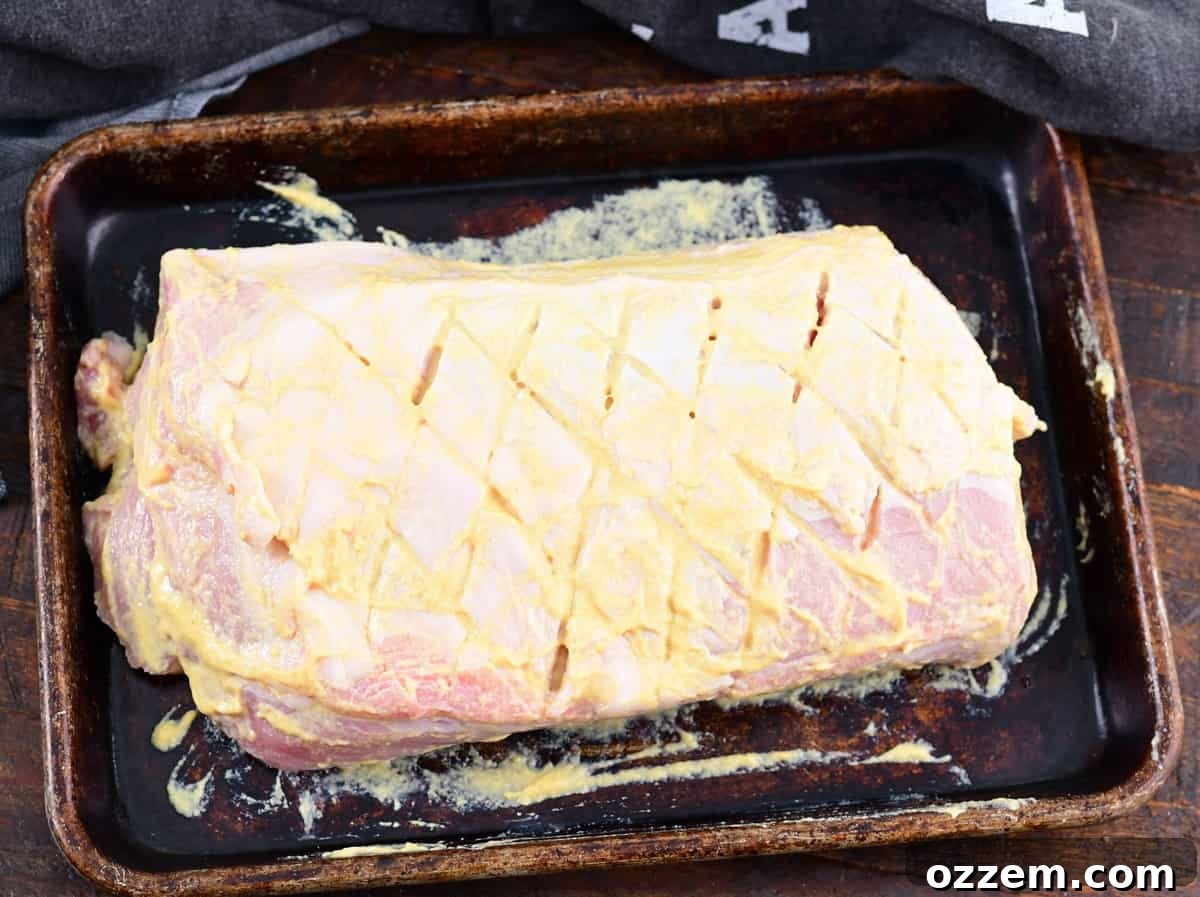 Wood-Fired Pork Loin Perfection 7 The pork loin generously coated with the flavorful dry rub.