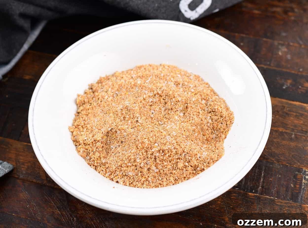 Wood-Fired Pork Loin Perfection 10 Thoroughly mixing all the dry rub ingredients in a bowl.