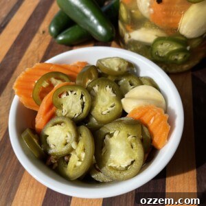 Homemade Pickled Jalapenos in a glass jar.