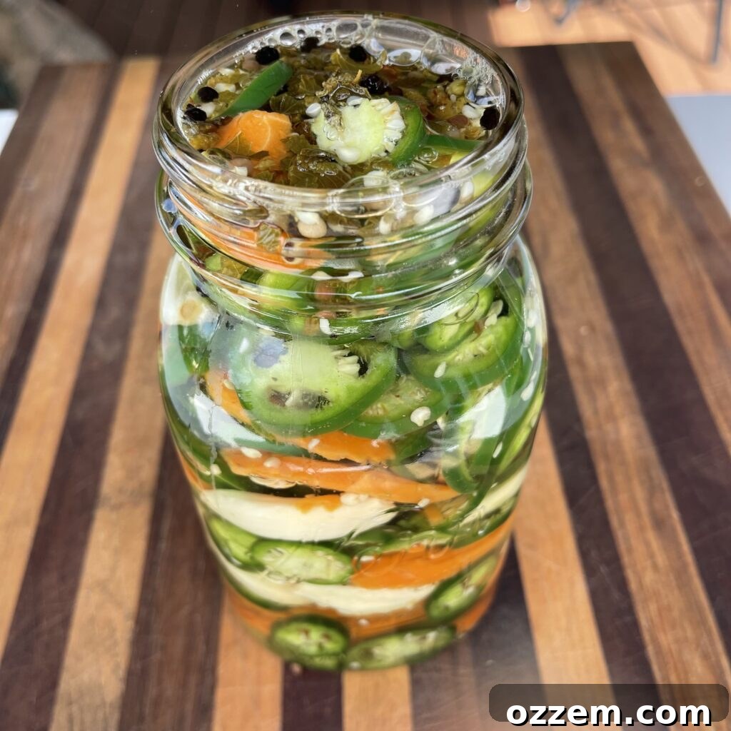 Zesty Jalapeno Slices 5 Finished jar of homemade pickled jalapenos ready for refrigeration.