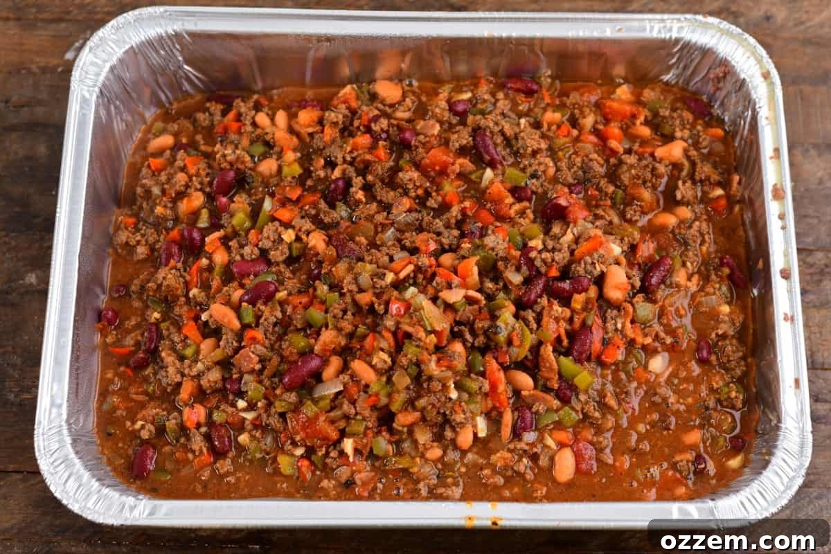 cooked chili in an aluminum pan.