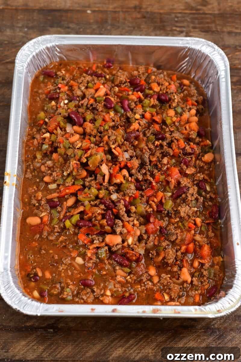 cooked chili in an aluminum pan.