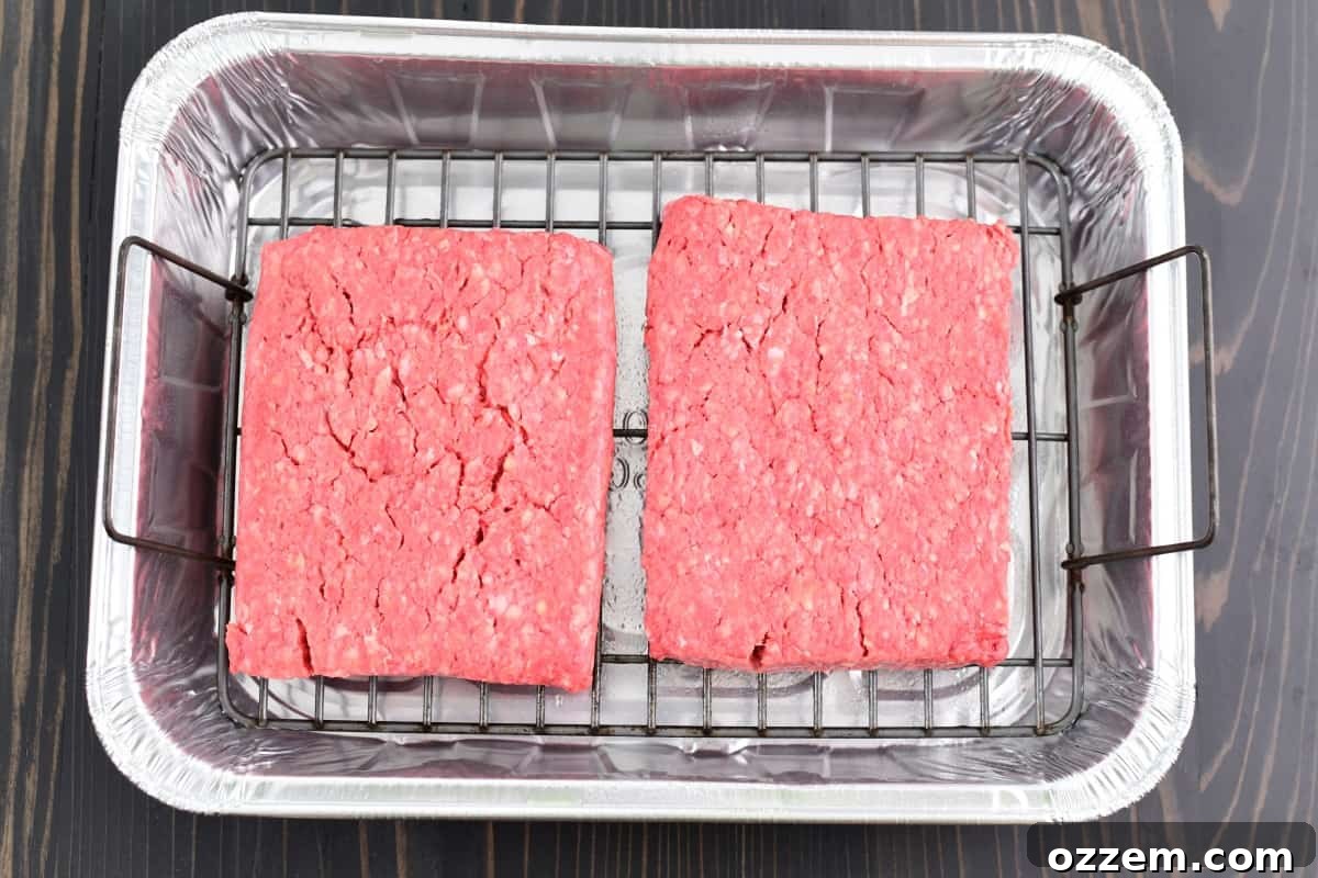 Raw ground beef in a tin pan