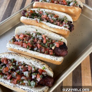 A perfectly cooked bacon-wrapped hot dog, golden and crispy, ready to be served.