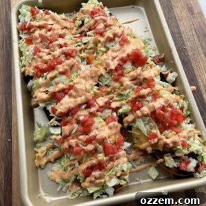 Grilled Big Mac Bread slices on a cutting board with toppings