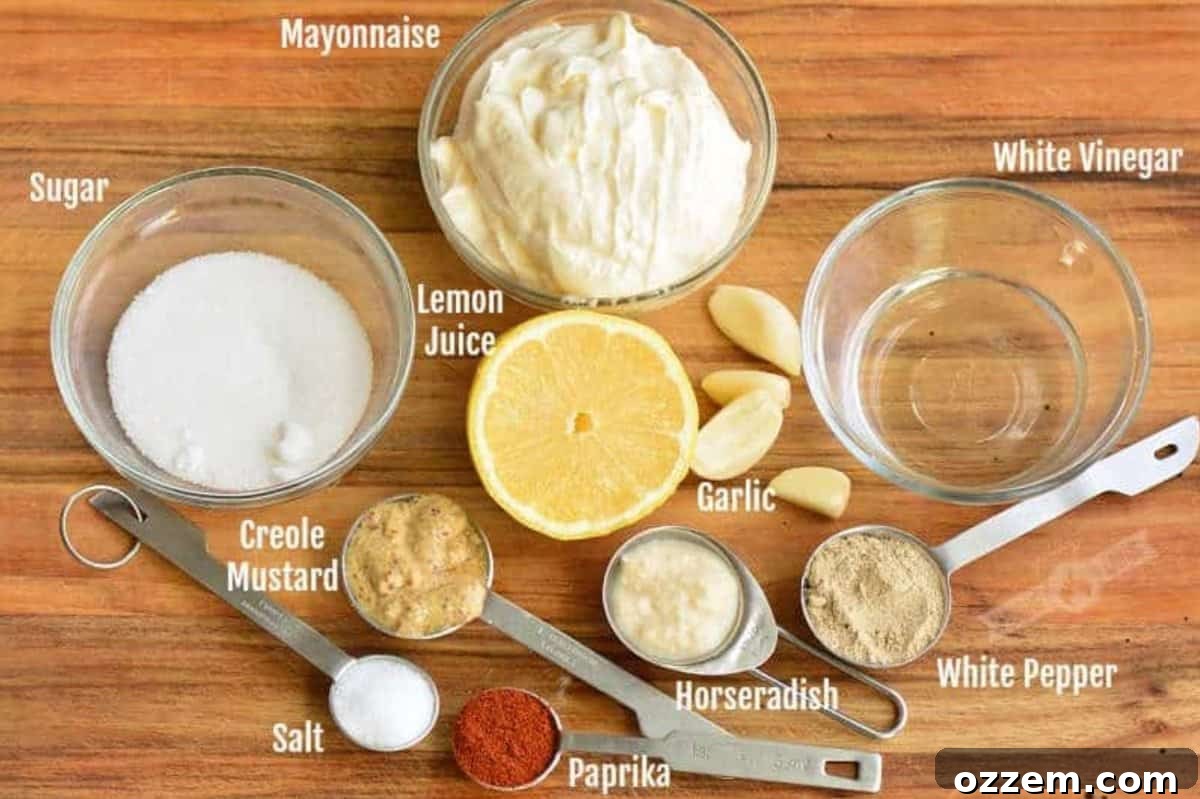 Southern Creamy White BBQ 3 labeled Ingredients for white BBQ sauce on a wood surface.