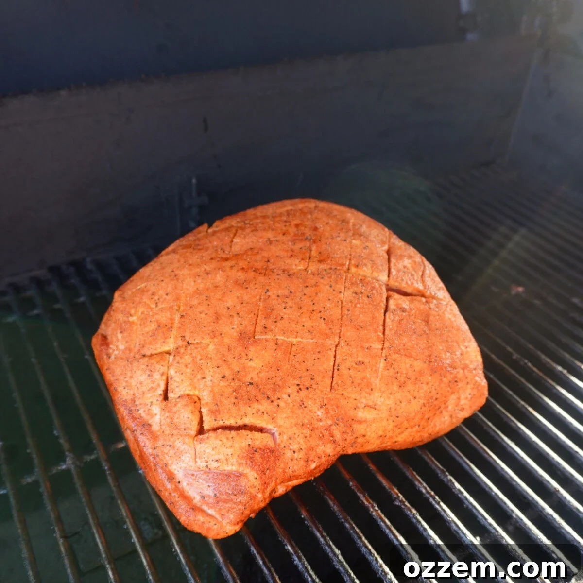 Timeless Pulled Pork Perfection 8 Raw seasoned pork shoulder placed on the grill grates.